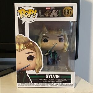 Funko Sylvie Figure with Gold and Green Accents